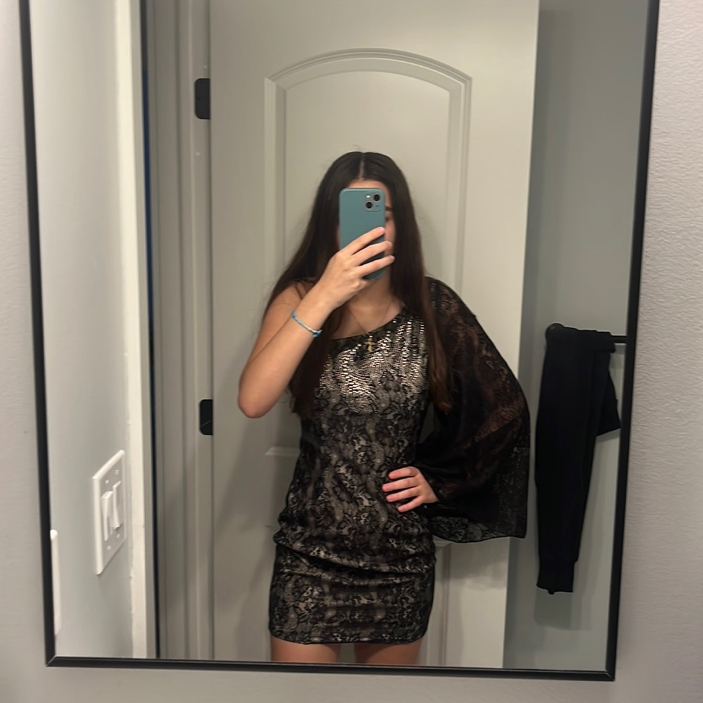 Black lacy elegant dress from Vegas Royalty. Size small